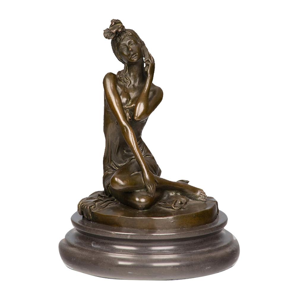 This is a bronze sculpture of a seated woman. The woman sits with bent knees, dressed in light fabric, and the fold textures of the clothing are delicately and realistically depicted; one hand gently touches her cheek, exuding a lazy and gentle demeanor that fully shows soft and elegant charm. This work is often used as a European-style home decorative ornament, combining artistic beauty and decorative value.