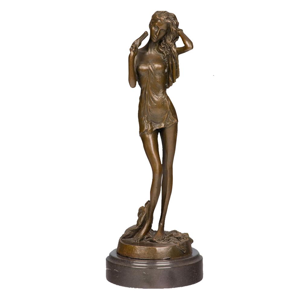 This is a bronze sculpture of a woman, with a soft and agile shape: the woman is dressed in light fabric, and the fold textures of the clothing are delicately and realistically depicted; one hand gently tucks her long hair, while the other holds a small object, exuding a gentle and lazy demeanor that fully shows soft charm. This work is often used as a European-style home or office decorative ornament, combining decorativeness and artistic sense.