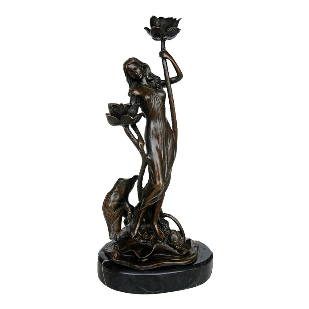 This is a bronze sculpture of a woman holding lotus. The woman poses elegantly, wearing a flowing long dress. She holds a blooming lotus high in one hand and a lotus bud in the other, with lotus leaf decorations around her. The overall craftsmanship is exquisite, integrating natural elements with the soft temperament of the woman, conveying a fresh and gentle artistic atmosphere, and it has high decorative ornamental value.
