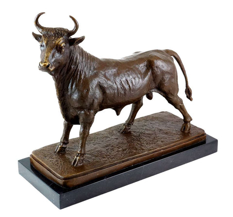 This is a bronze sculpture of a bull. The bull is in a standing posture, with a robust body, full and delicate muscle lines, and sharp horns, exuding a strong sense of power. The sculpture is mounted on a black marble base, which contrasts with the bronze bull in texture, providing stable support while adding a solemn atmosphere. The overall craftsmanship is exquisite, vividly presenting the bull’s toughness and calm temperament, and it has high artistic appreciation.