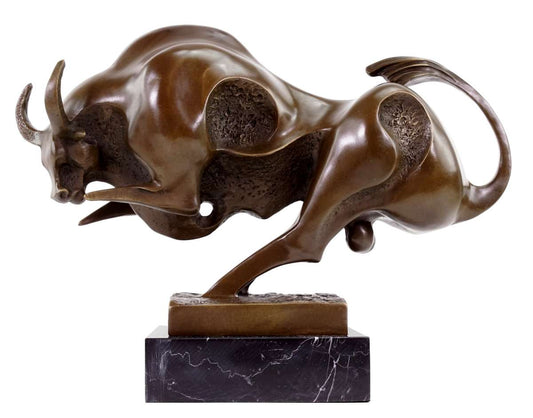 This is a bronze sculpture of a bull in an abstract style. The bull is in a dynamic running posture, with a simple and smooth shape. It showcases a strong sense of power through exaggerated lines and hollow designs, and the bronze surface has a delicate and layered texture. 