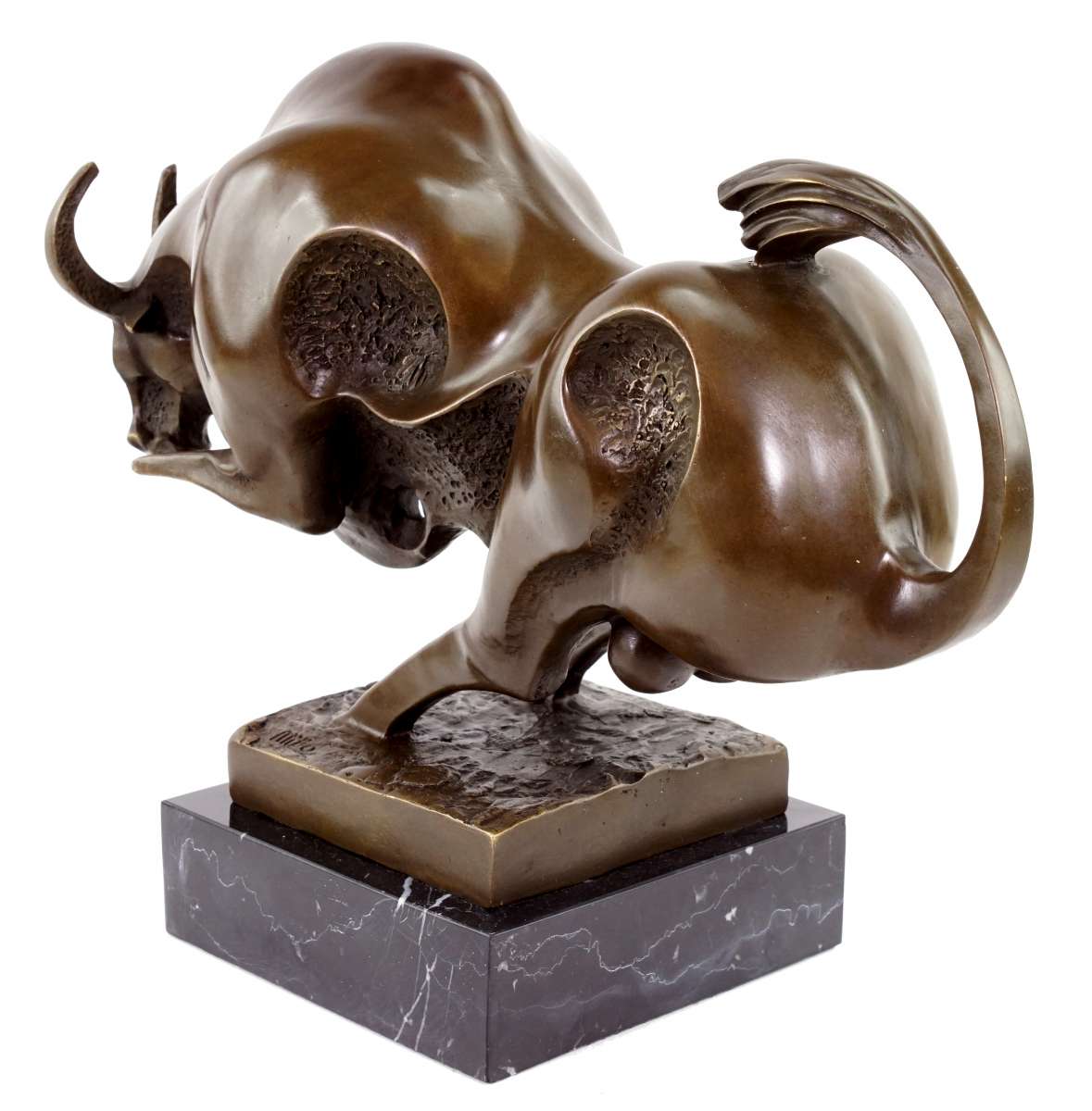 Bronze sculpture of a charging bull on a marble base