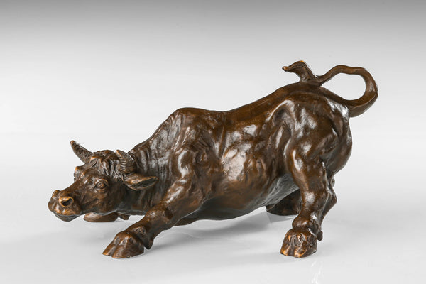 Powerful Wall Street Charging Bull bronze sculpture crafted using the lost-wax casting method. A timeless symbol of strength, resilience, prosperity, and bull market energy.