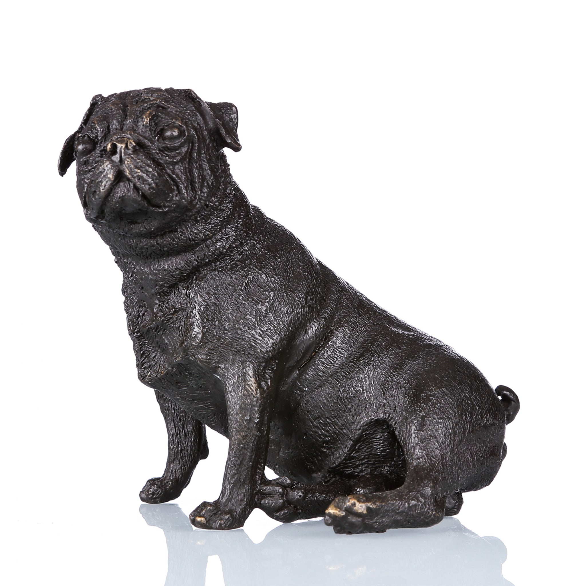 This is a bronze sculpture of a Pug. The Pug is in a sitting posture, with delicate and realistic depictions of facial wrinkles and fur texture, and it has a cute demeanor. The bronze surface has a thick texture, and the overall shape vividly restores the lovely appearance of the Pug, with high realistic artistic value and ornamental value.