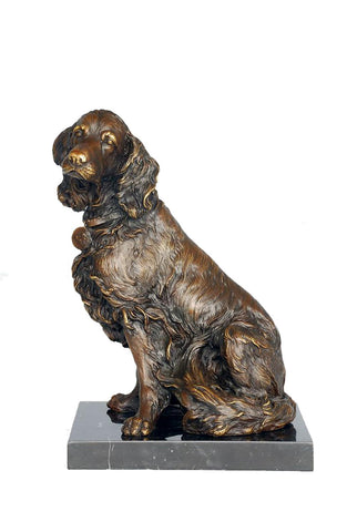 This is a bronze sculpture of a dog. The dog is in a sitting posture, with delicate and realistic fur texture, and a gentle and natural demeanor. It wears a collar with a round tag around its neck, with exquisite details. The sculpture is mounted on a dark marble base with a regular shape, which contrasts with the texture of the bronze dog, providing stable support while adding an elegant touch. 