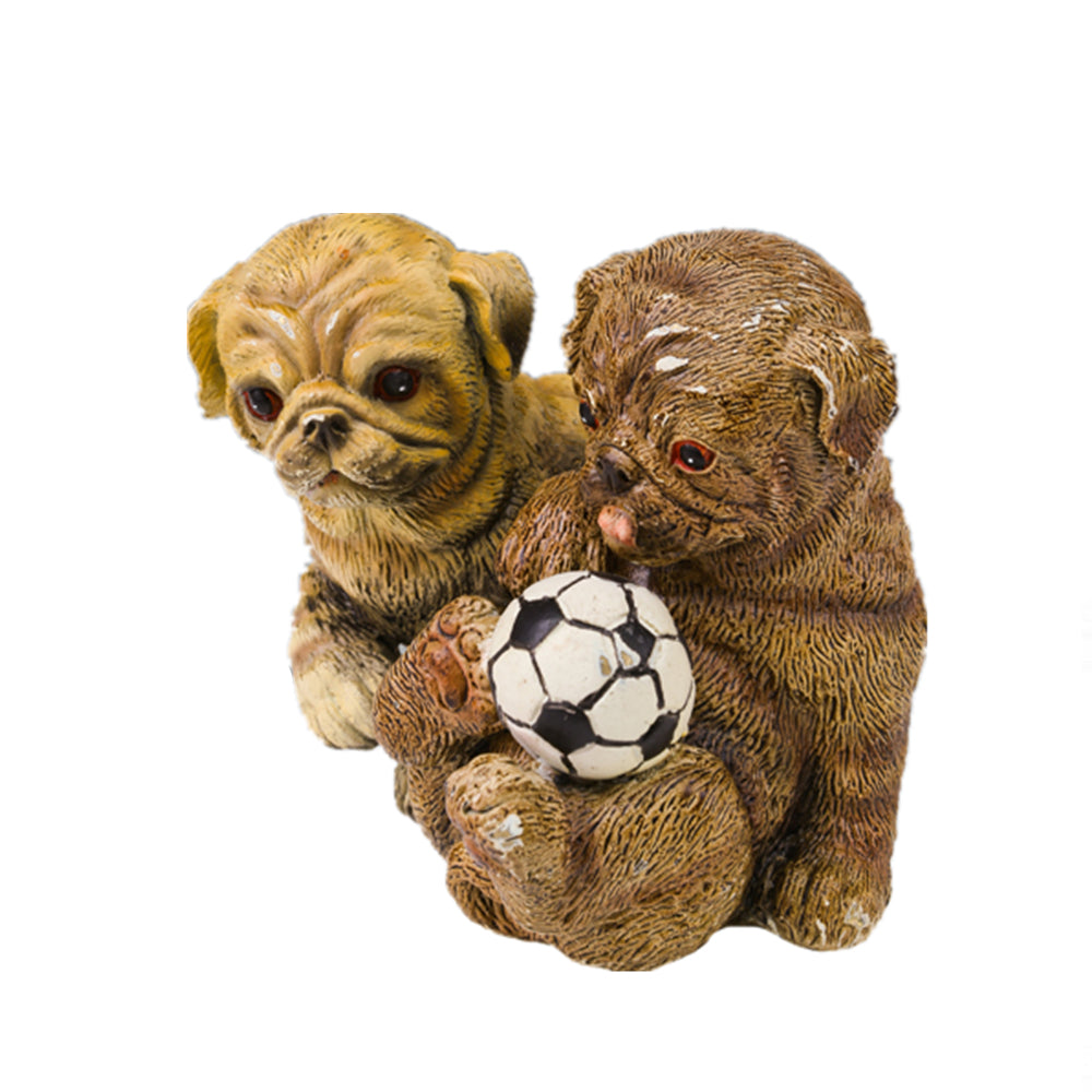 This is a bronze dog sculptures, depicting a scene of two cute puppies playing interactively. One is light yellow, and the other is brown. Their fur textures are delicate and realistic. They play around a black-and-white soccer ball, with one puppy sticking out its tongue, looking lively and playful. The overall style is cute and warm, with vivid details, conveying a cheerful atmosphere, and it has strong ornamental and fun value.