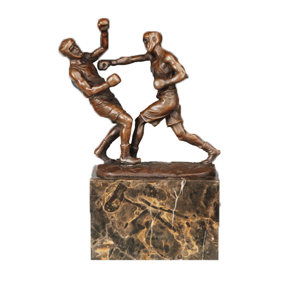 This is a bronze boxer sparring sculpture.The sculpture presents the dynamic confrontation pose of two boxers—one throwing a punch to attack, the other dodging to defend, with realistic details of gear like boxing helmets and gloves, and body lines that are tight and full of combat tension, accurately restoring the competitive atmosphere of boxing. It is a decorative ornament themed around combat sports, suitable for display in homes or sports-related spaces.