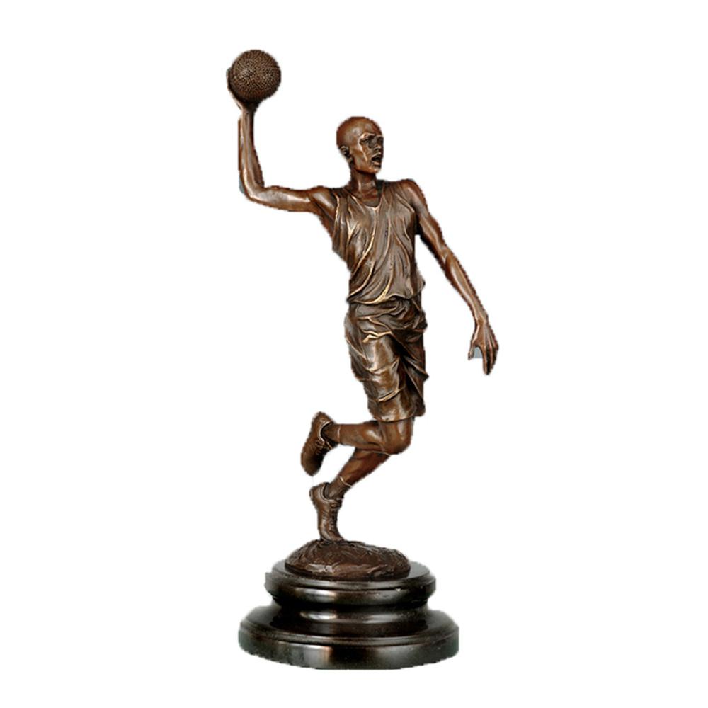 This is a bronze basketball player sculpture.The player in the sculpture strikes a dynamic pose of jumping with a ball, with realistic details of gear like the basketball uniform and sneakers, and body lines that are tight and full of explosive power, accurately restoring the competitive tension of basketball. It is a decorative ornament themed around ball sports, suitable for display in homes or sports-related spaces.
