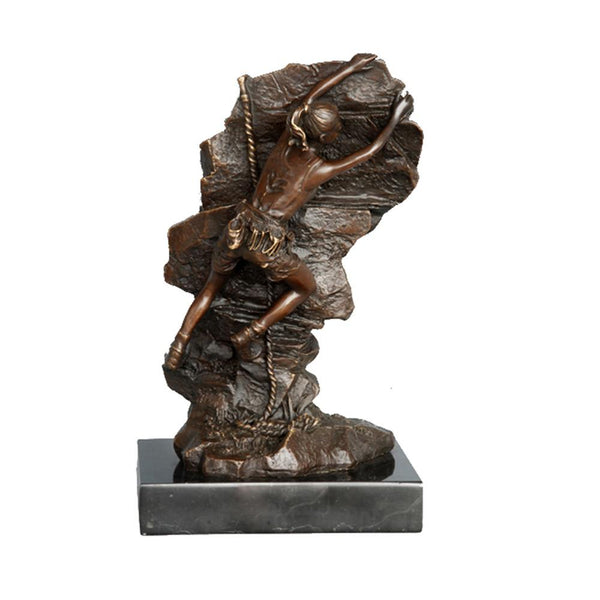 This is a bronze rock climber sculpture: The climber strikes a dynamic climbing pose, gripping the rock wall with both hands, with realistic details of waist gear buckles and ropes. The bronze has a dark brown texture, paired with a black stone base. It conveys the strength and focus of outdoor rock climbing, serving as a decorative ornament themed around outdoor sports.