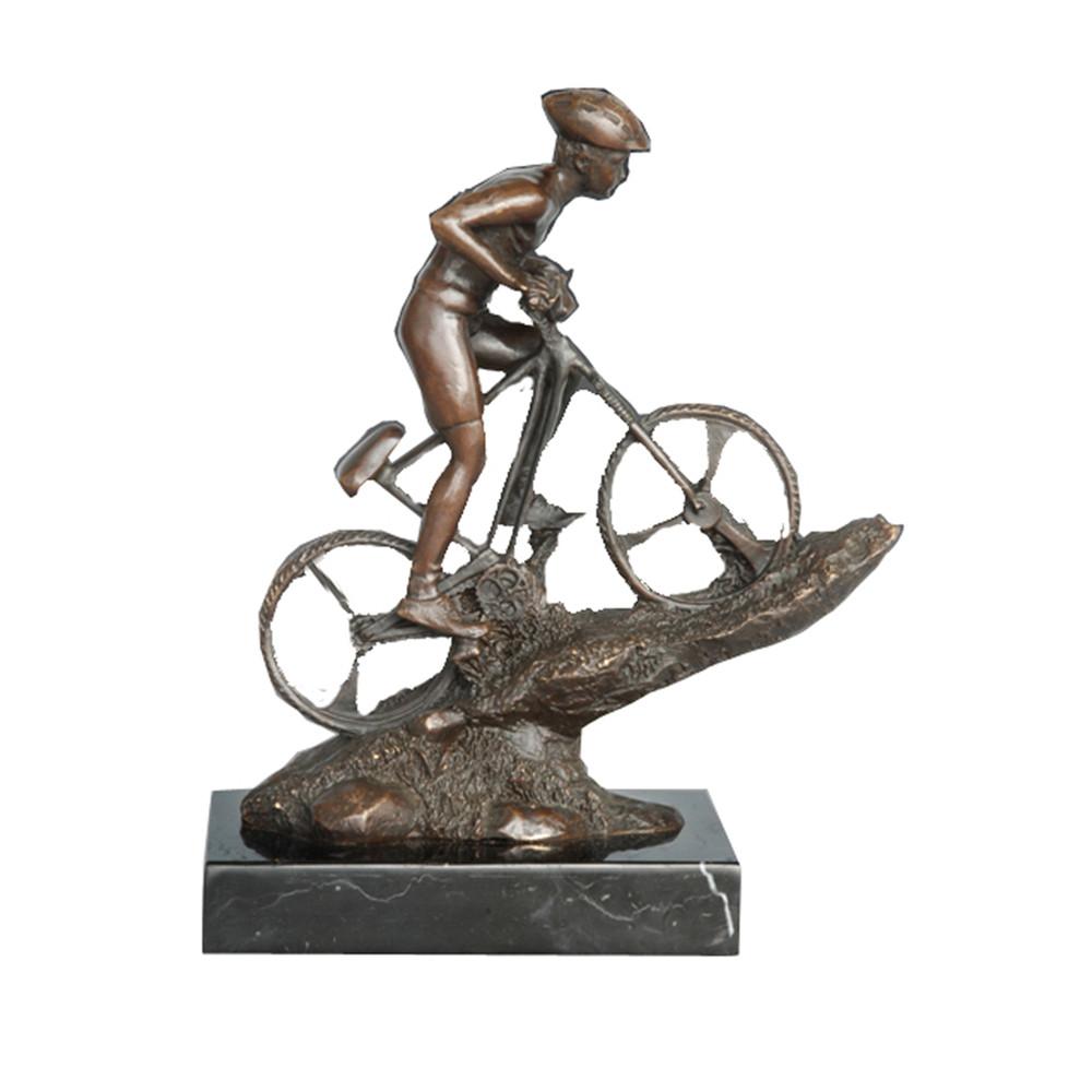 This is a bronze mountain biker sculpture: He leans forward to control the bike, striking a dynamic off-road riding pose, with realistic details of the helmet and bicycle. The bronze has a dark brown texture, paired with a black stone base. It conveys the dynamism and vitality of outdoor cycling, serving as a decorative ornament themed around outdoor sports.