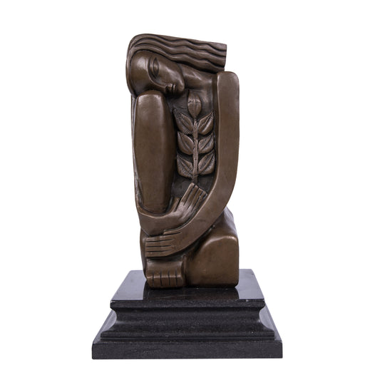 This is a modern abstract-style sculpture made of bronze.It depicts a female figure in a curled posture: her eyes are gently closed, her long hair falls naturally, her arms wrap around herself to form a soft wrapping sense, and an olive branch (a classic symbol of peace) is embedded on one side of her body. It not only conveys a tranquil and gentle atmosphere, but also implies the theme of "peace and protection" through the olive branch.