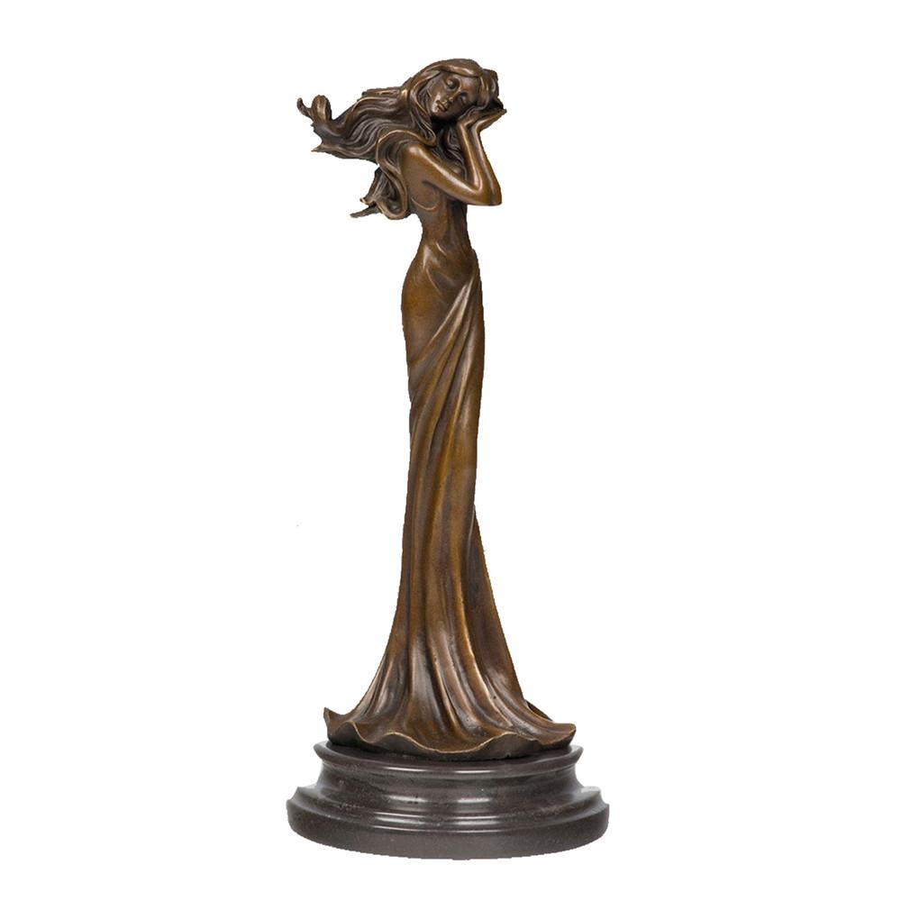 This is a bronze sculpture of a woman. The woman is wearing a flowing long dress, with her hair fluttering in the wind. She poses elegantly, with one hand resting on her cheek, exuding a gentle and graceful charm. The sculpture is mounted on a dark marble base, which contrasts with the bronze body and adds an elegant atmosphere. The overall craftsmanship is exquisite, conveying a romantic artistic atmosphere through delicate lines and dynamic shaping, and it has high ornamental value.